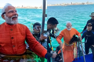 modi-immersed-in-water-dwarka-installs-peacock-feather